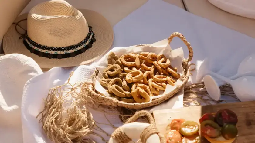 Traditional Puglian taralli served on board during a boat excursion