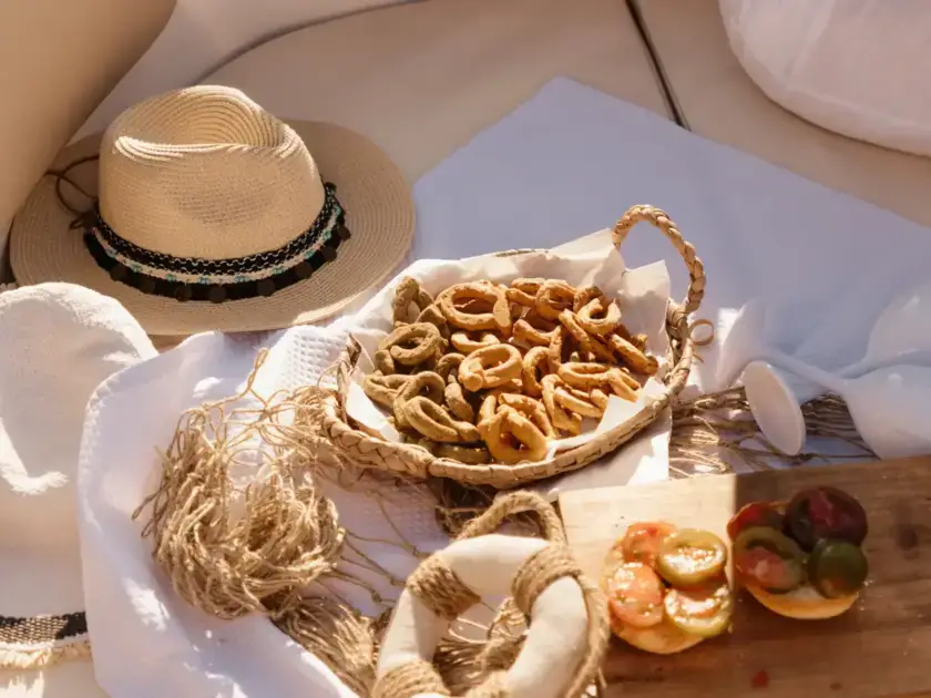 Traditional Puglian taralli served on board during a boat excursion